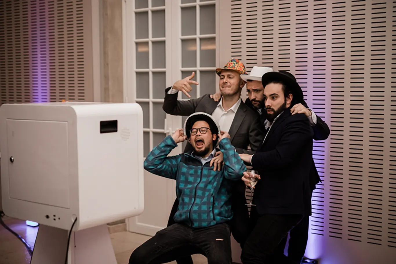 People having fun with an event photobooth